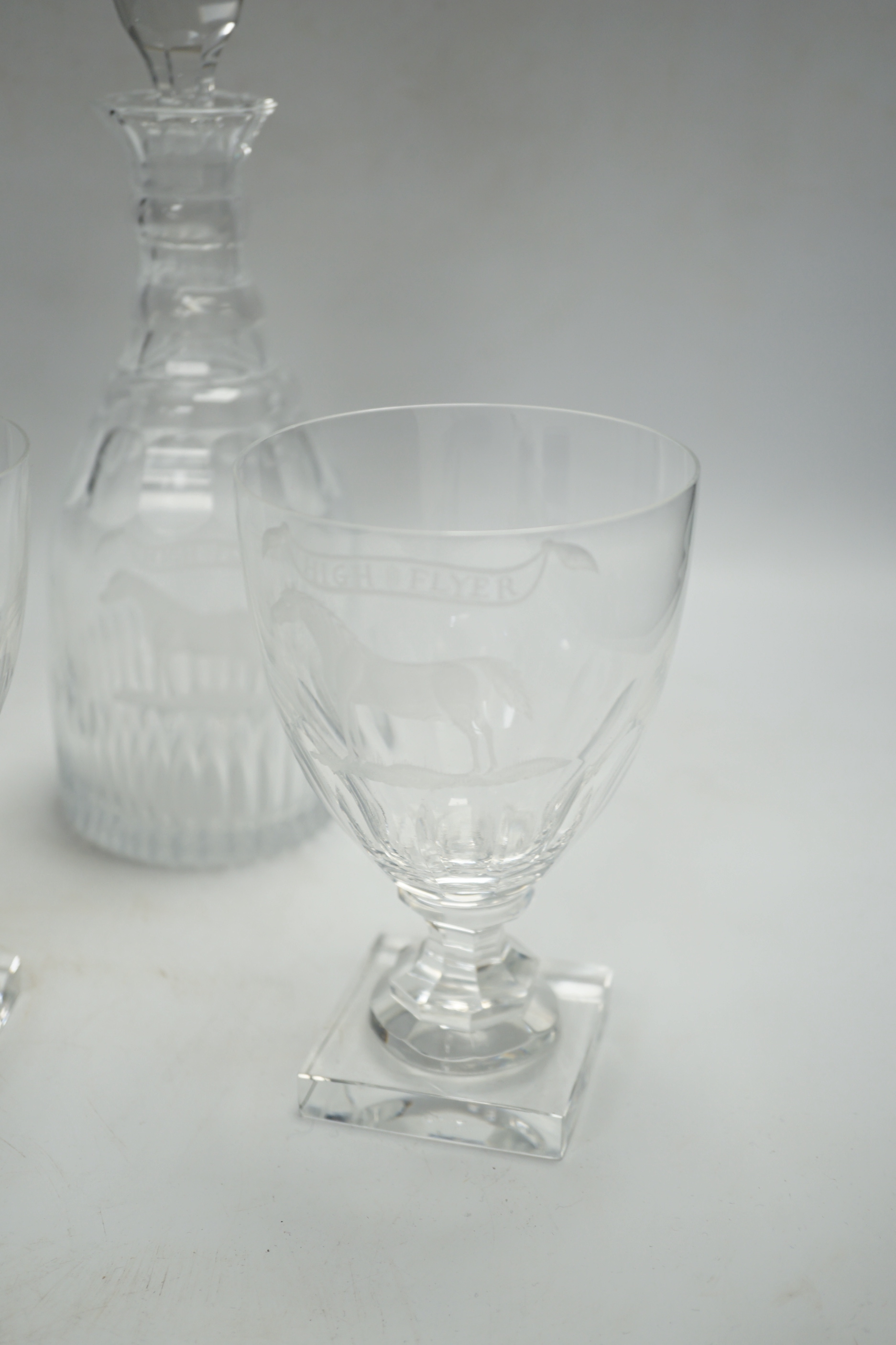 A suite of George III-style drinking glassware, consisting of a pair of decanters and stoppers and three square based rummers, each engraved with an image of the legendary racehorse, High Flyer, decanters 24.5cm, Please
